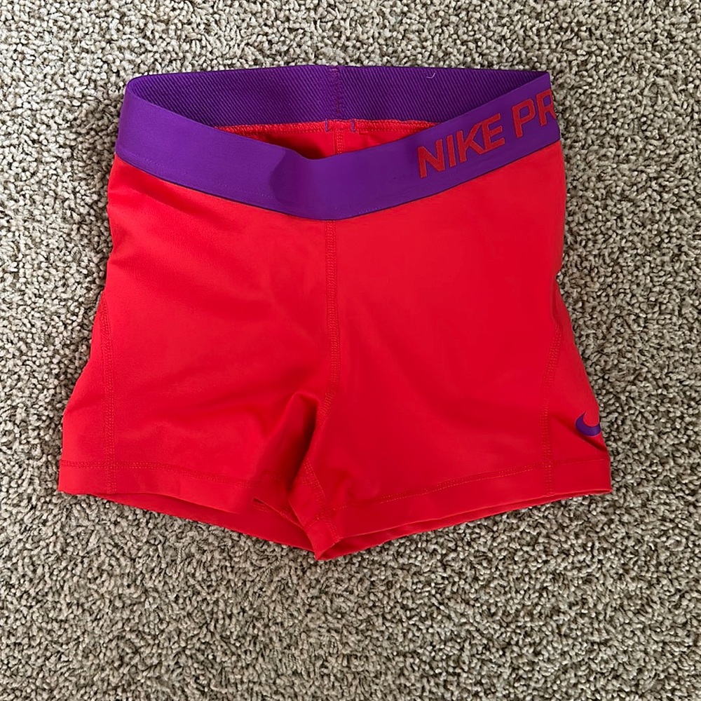 Nike pros, red spandex, athletic